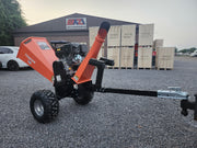 Chipease D1500E wood chipper showing 990mm tow bar and all-terrain wheels