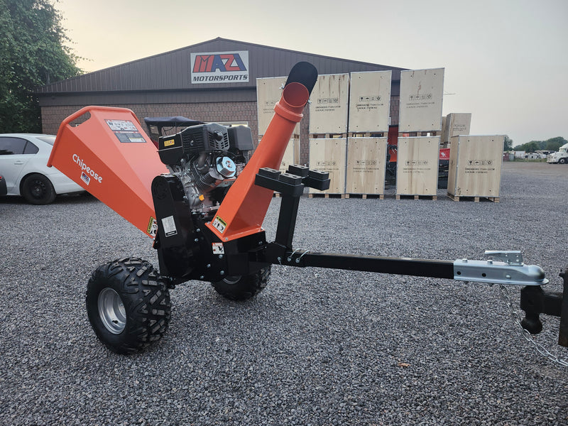 Chipease D1500E wood chipper showing 990mm tow bar and all-terrain wheels