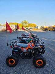 125cc Landward Trailmaster kids gas ATVs lined up in stock at Mazi Motors Ontario