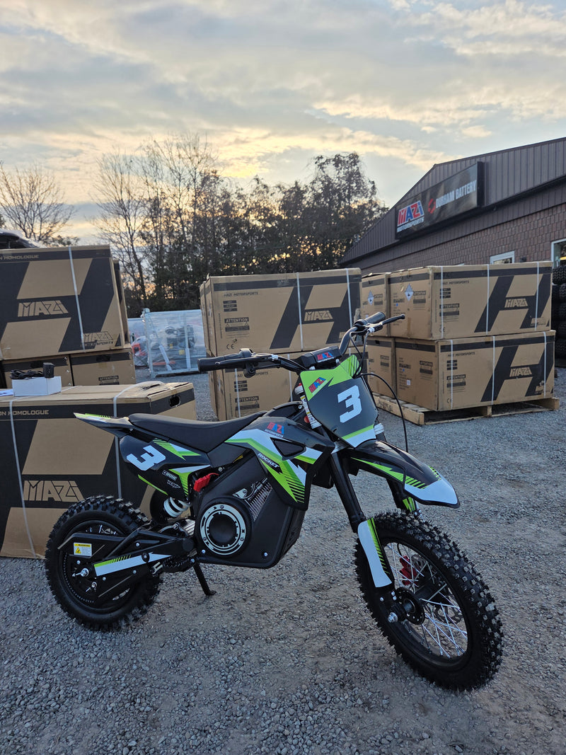 Mazi Rocket 1000W electric kids dirt bike in green front angle view at Mazi Motors Ontario