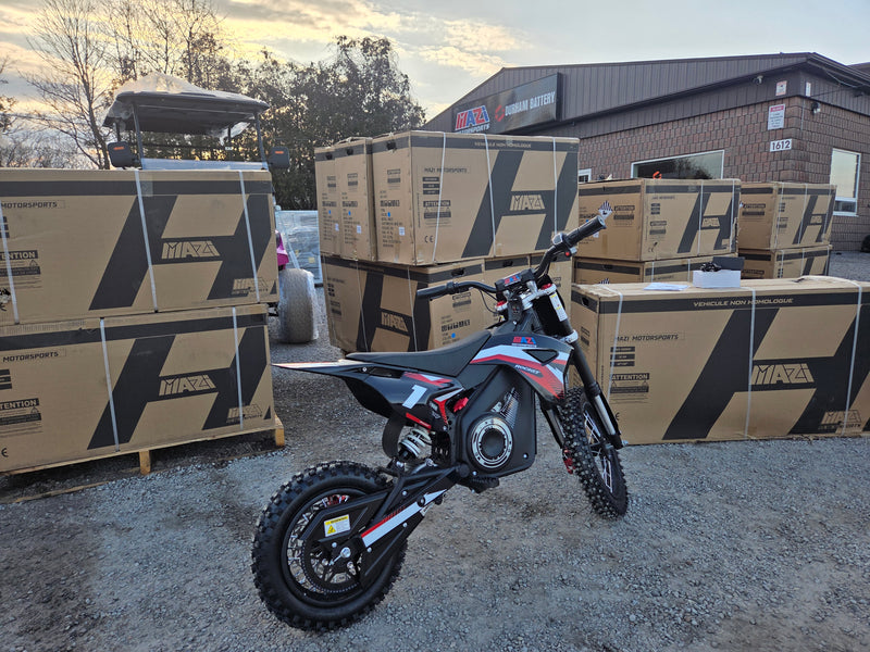 Mazi Rocket 1300W kids electric dirt bike side view showing 1300W motor and Rocket graphics